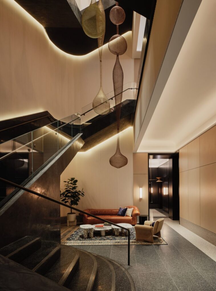 Kimpton Era hotel atrium with blackened-steel staircase