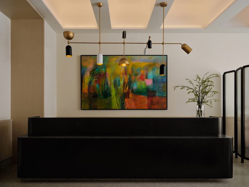 Kimpton Era hotel atrium with blackened-steel staircase