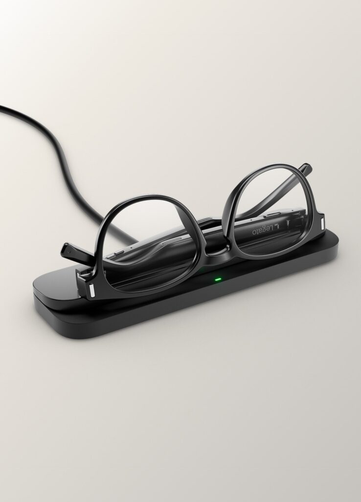 Legato hearing glasses on charging pad