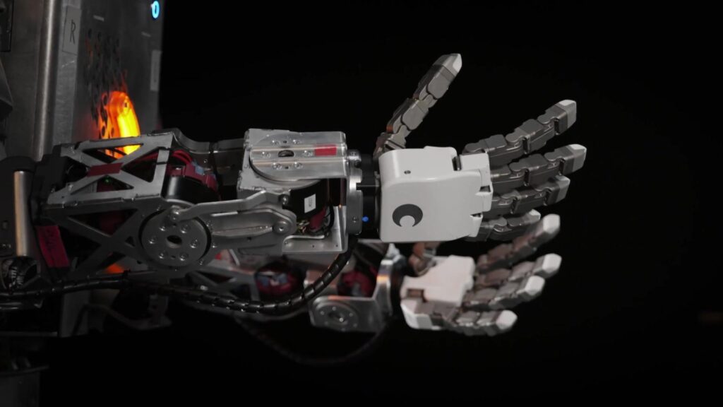 Roger robot hand, still from the Minerva launch film