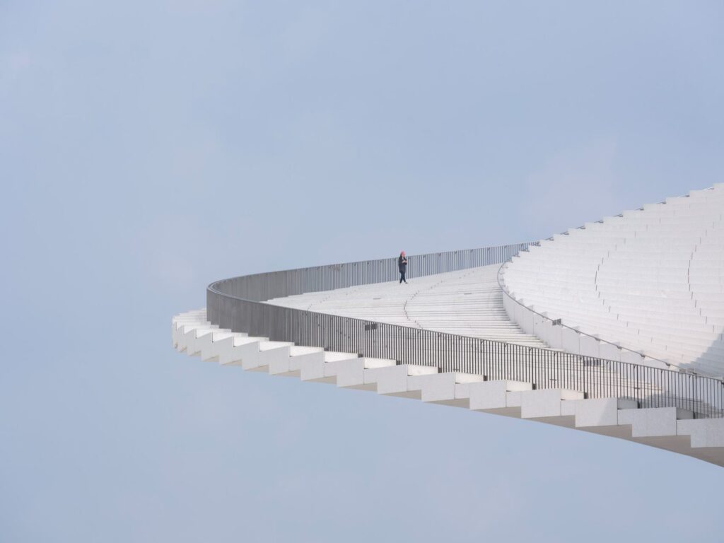 Shanghai Grand Opera House by Snøhetta with its spiral staircase rising to a public roof (Snøhetta), photo 4 (Snøhetta (photos: Yumeng Zhu, Tian Fangfang, Chen Hao, StudioSZ, via Dezeen and Snøhetta))