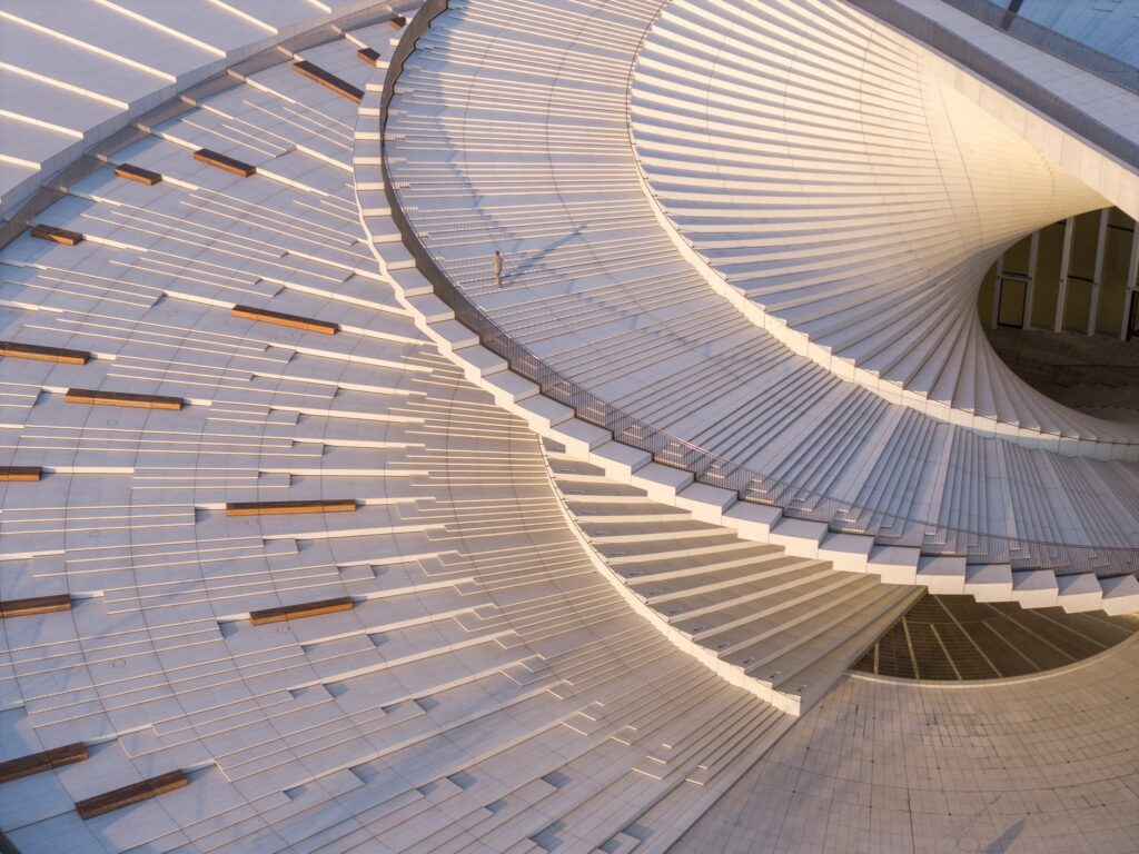 Shanghai Grand Opera House by Snøhetta with its spiral staircase rising to a public roof (Snøhetta), photo 6 (Snøhetta (photos: Yumeng Zhu, Tian Fangfang, Chen Hao, StudioSZ, via Dezeen and Snøhetta))