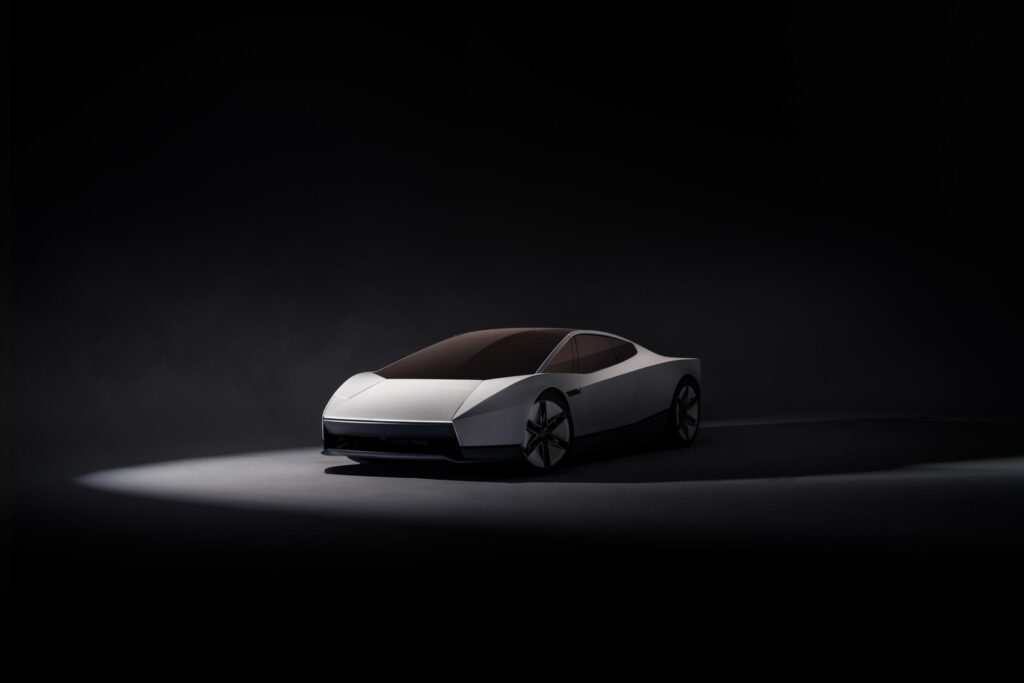 Roadster climbing the curved ramp with suction downforce (Tesla via The Verge)