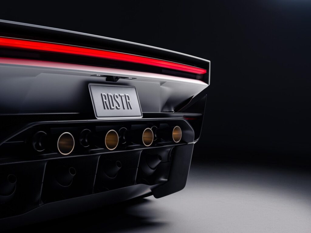 Roadster jumping over Tesla lineup including Cybertruck and Semi (Tesla via The Verge)