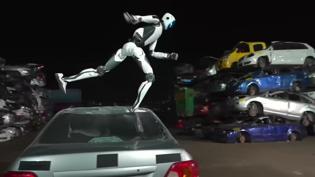 H2-X flips off the roof of a car in a junkyard (Unitree Robotics, official video)